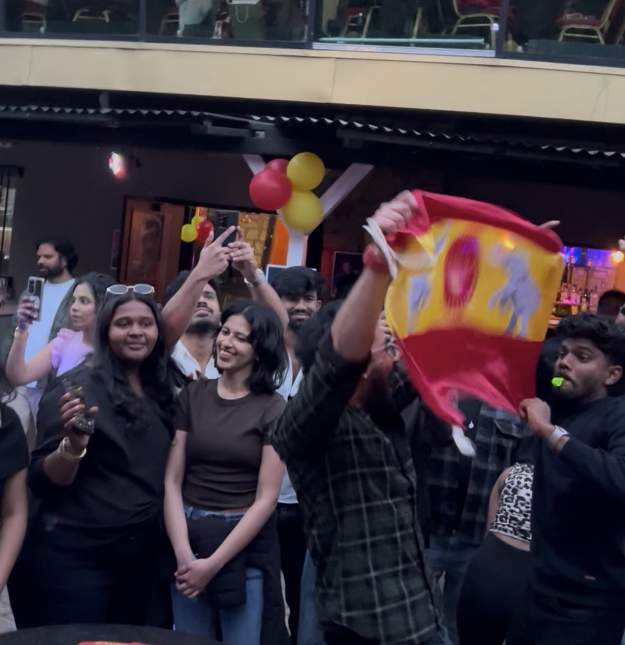Waving the TVK flag with pride